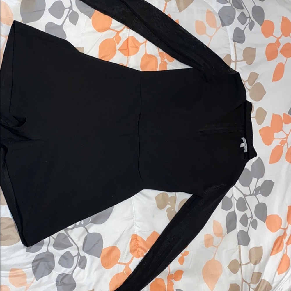 Black turtle neck romper.